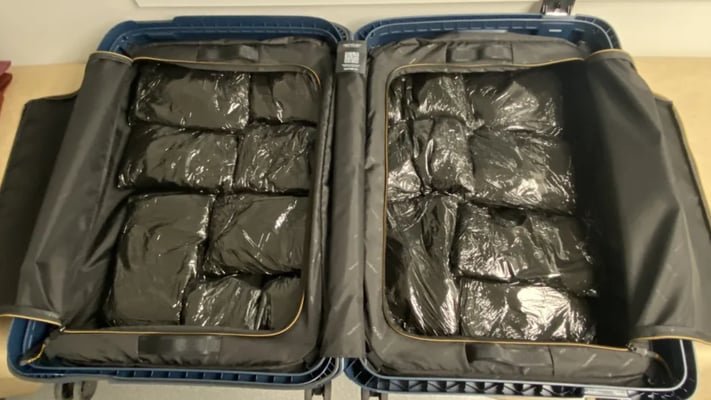 A Customs NZ photo showing 25.71kg of MDMA (ecstasy) stashed in a suitcase and seized at Auckland International Airport on 13 March 2024. Photo: Customs NZ / Supplied