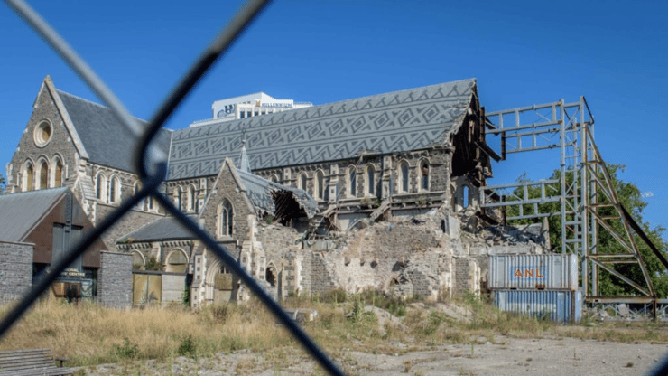 ChristChurch Cathedral which was damaged in the earthquakes of 2011 is seen behind a fence
