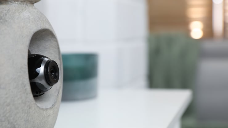An Auckland business owner has been charged with 64 counts of making intimate visual recordings of others over several months