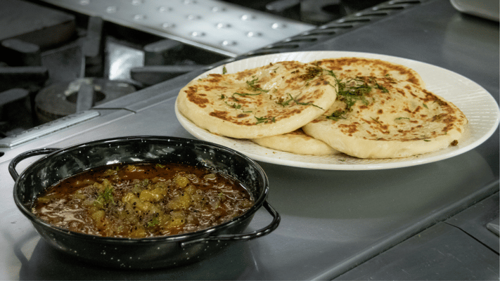 Goda Masala Paneer Stuffed Kulcha with Kiwifruit Panch Phoron Chutney