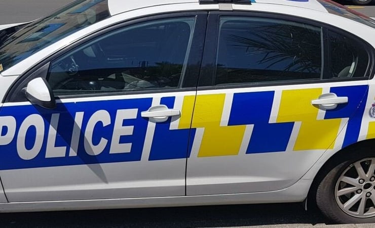 Police attending a possible stabbing incident on Anzac Avenue