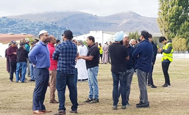Community gathers for first funeral of a father-son duo
