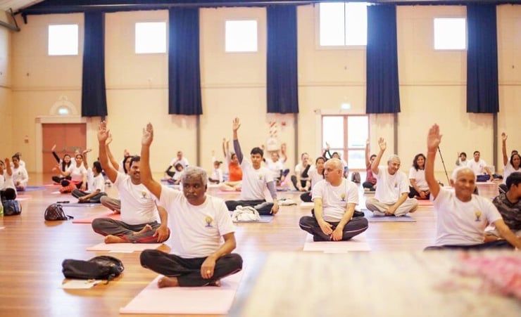 IDY 2019: Govt officials join community at Wellington Yoga Day