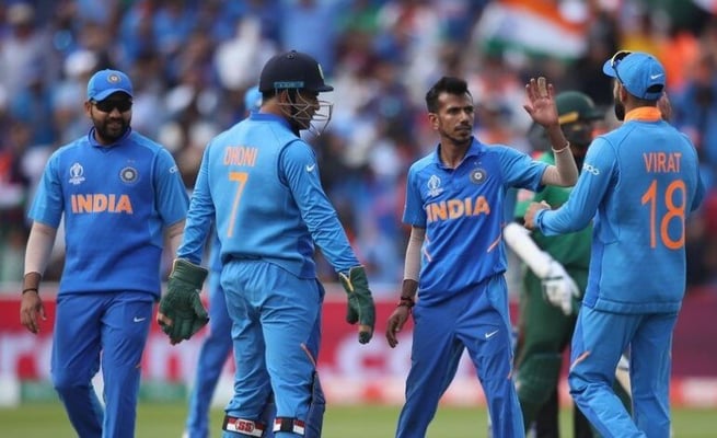 India fend off Bangladesh to seal semi-final seat
