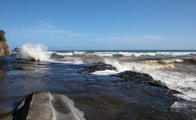 Body of a male person recovered near Muriwai Beach