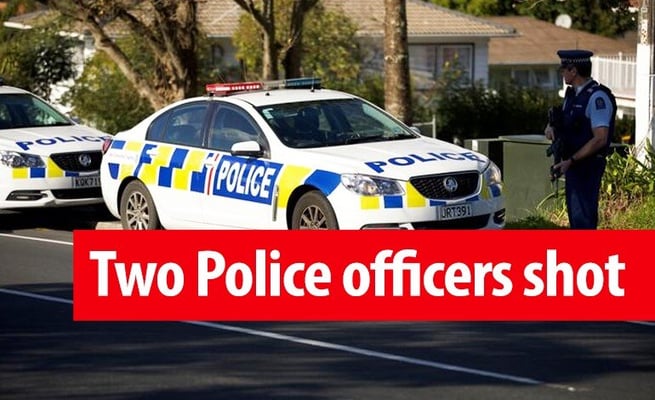 Two police officers shot, bystander hit by car in West Auckland