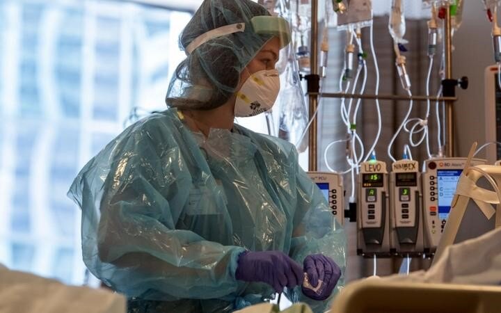 'Precarious time': US records quarter of a million Covid-19 deaths