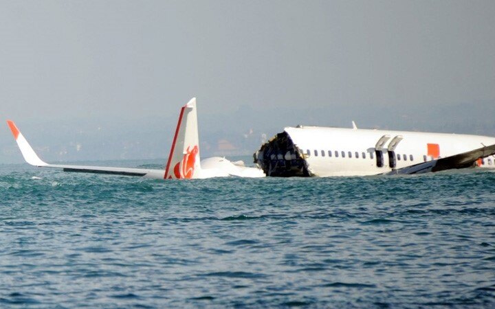 Indonesian airliner crashes into waters off Jakarta with 62 aboard, including 10 children