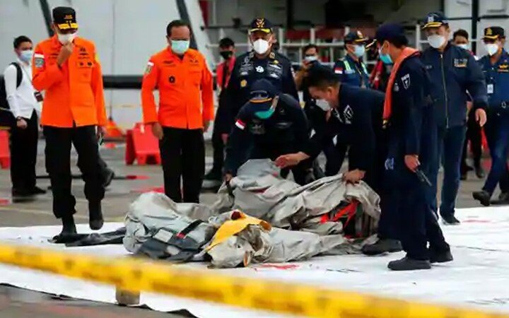 Human body parts retrieved from Indonesian plane crash site