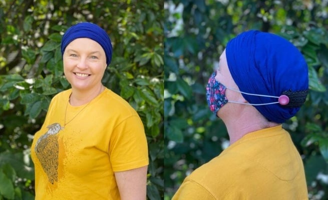 Sikh woman making 'Aroha' mask bands for a noble cause