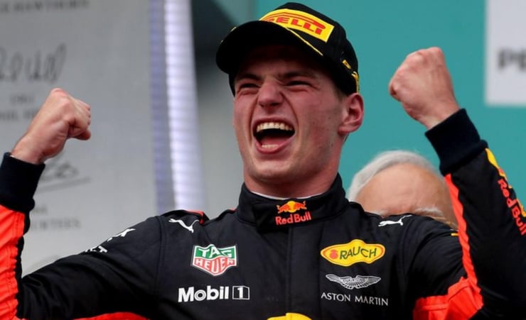 Verstappen wins first F1 title with last lap overtake