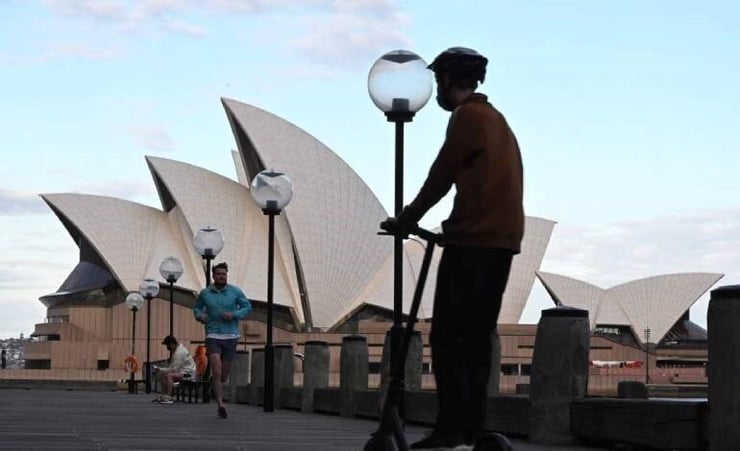 Australia reports record number of Covid cases for 5th straight day