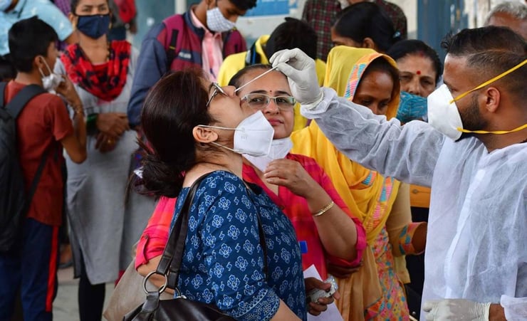 India's daily Covid cases drop below 1 lakh