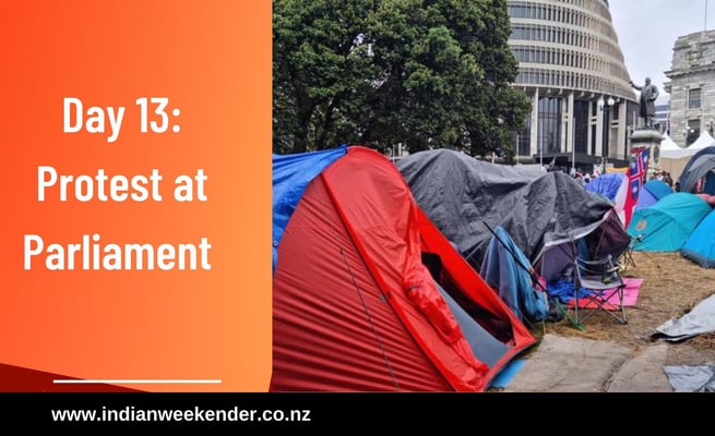 Protest remains entrenched on day 13 despite heavy rain