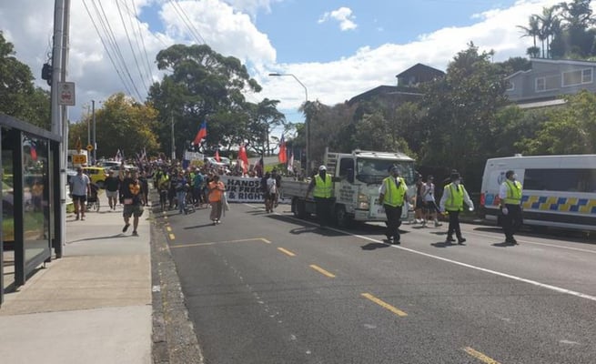 Anti-mandate protesters march across Auckland Harbour Bridge