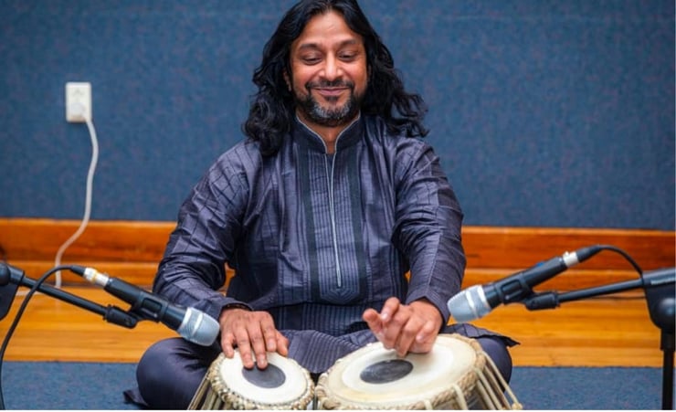 Musician introducing young aspirants to the tabla