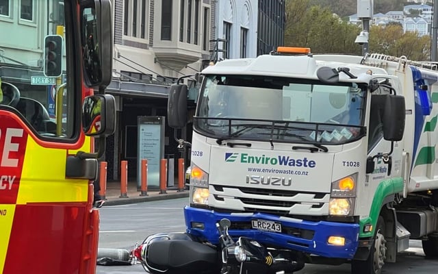 Man pinned under truck escapes serious injury