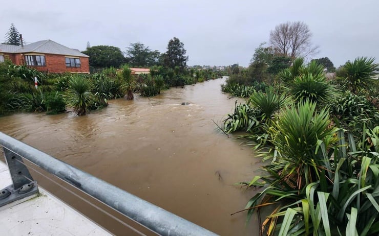 Torrential rain leaves roads closed after flooding and slips