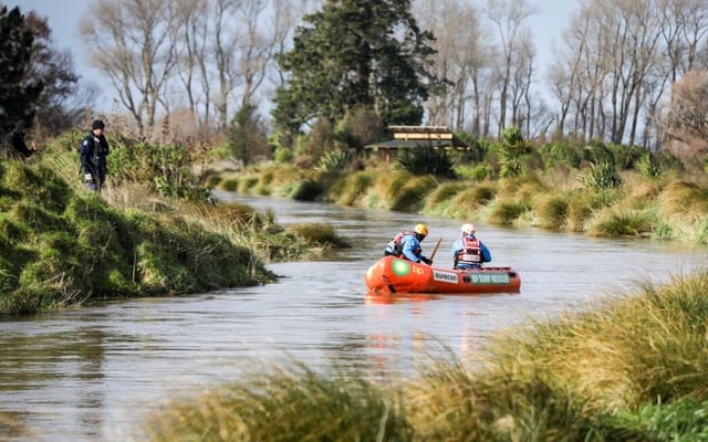 Yanfei Bao search continues but police waiting for water levels to recede