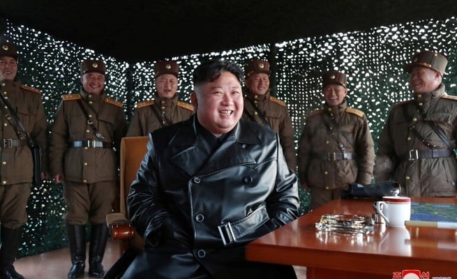 North Korean leader visits military factories, calls for 