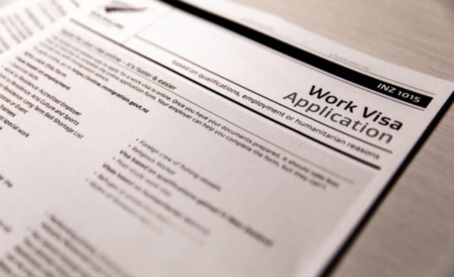 Migrants with visas linked to employers under investigation told not to come to NZ