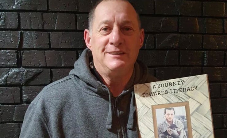 Man who learned to read and write in his late 50s becomes an author