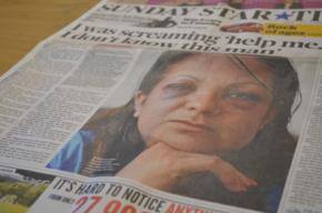Neighbours watch as Indian woman gets bashed