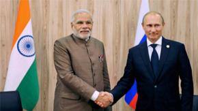 Putin arrives in India, Modi looks to productive visit