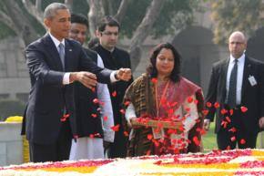 Obama pays tribute to Gandhi, plants sapling