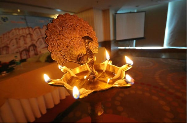 The significance of lighting a lamp ('deepam')