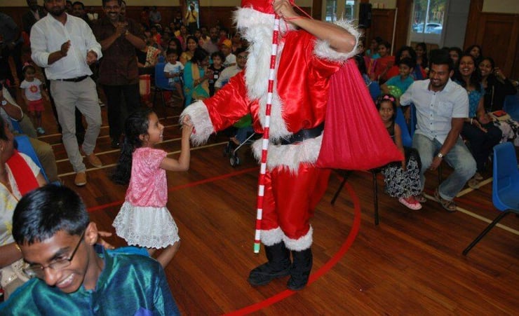 Santa woos children at Malayali Samajam Xmas