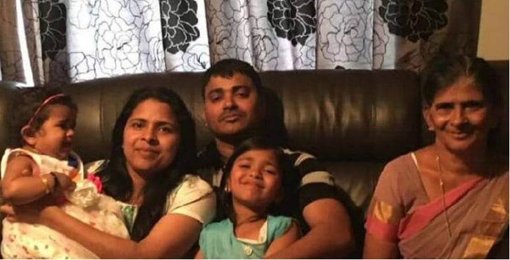 Waikato Indian Family: Community in close huddle on next course of action