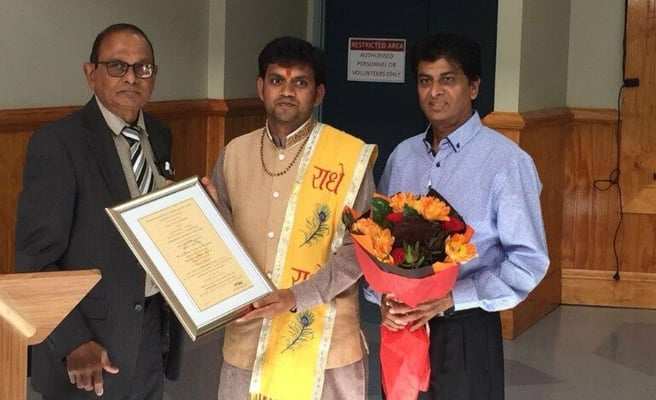 Meet the doctorate-priest of Radha Krishna Temple