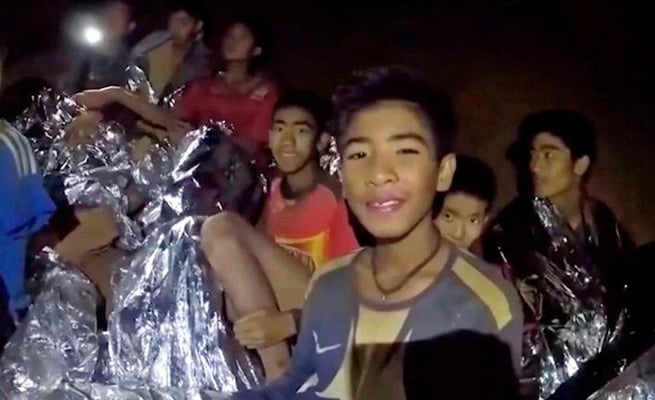 All 12 boys, football coach rescued from flooded Thailand cave